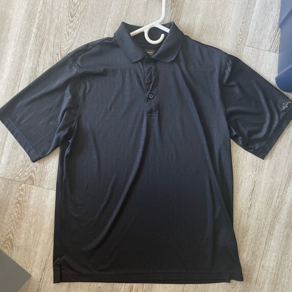 Greg Norman Play Dry Golf Polo in Black